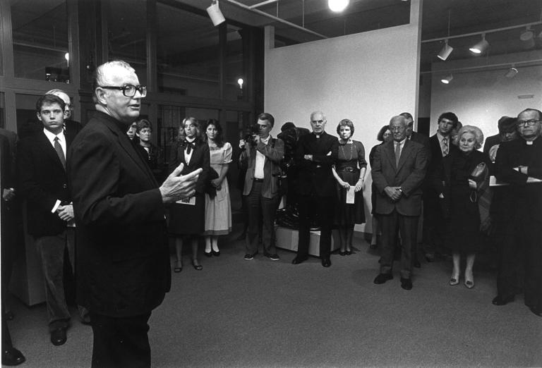 Rev. John E. Brooks, S.J., president of the College, speaks at the opening of the Iris & B. Gerald Cantor Art Gallery