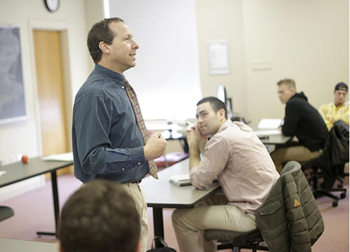 Victor Matheson, professor of economics, is seen here teaching a class during the Spring 2018 semester.