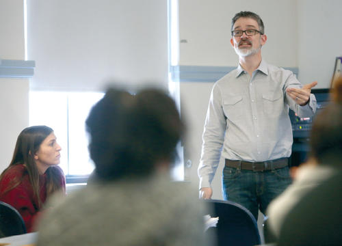 Jeremy Jones, assistant professor of anthropology, lectures in front of his class
