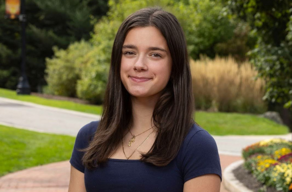 young woman smiling at the camera