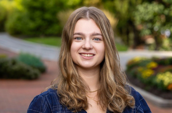 young woman smiling at the camera