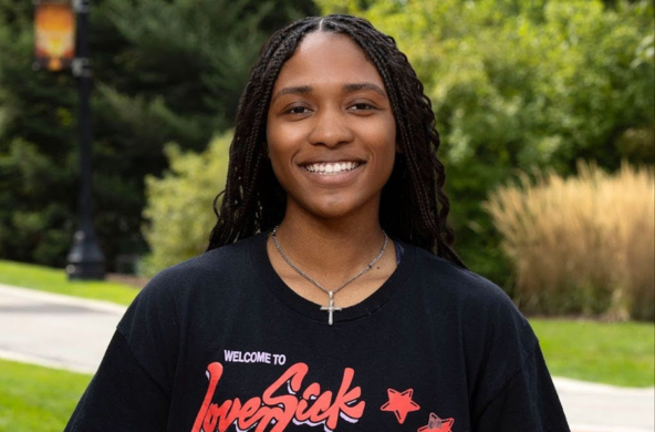 a young woman wearing a black shirt