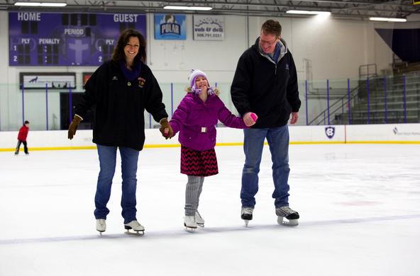 family members ice skating as part of Winter Homecoming activities
