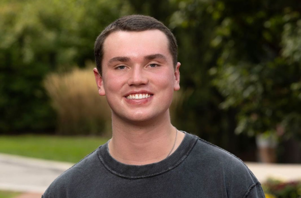 young man in a gray shirt