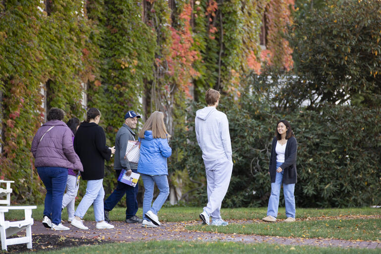 students and families taking a tour of campus