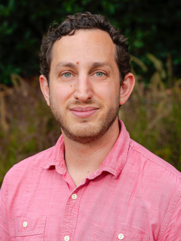 man in a red button down shirt