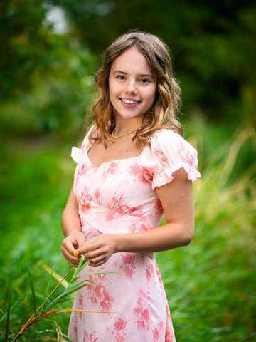 young woman in a floral dress