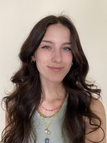 a young woman in a green shirt