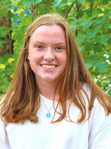 a young woman in a white shirt