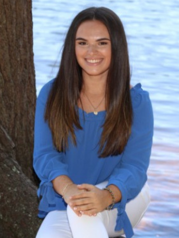 a young woman in a blue shirt