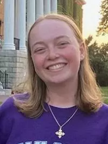 young woman in a purple shirt