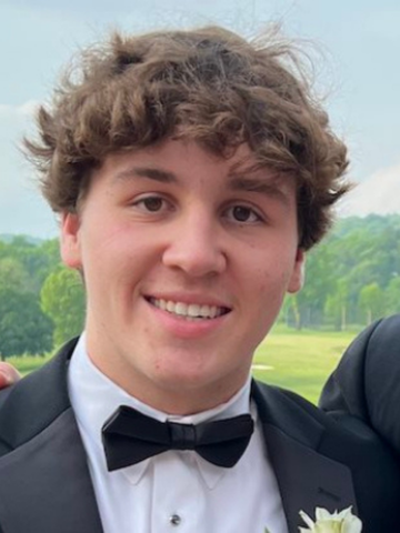 young man wearing a bow tie 