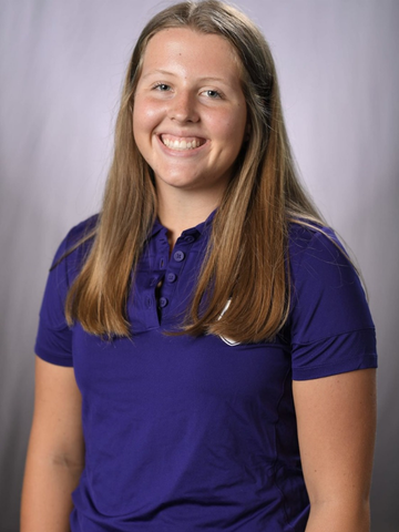 a young woman in a purple shirt