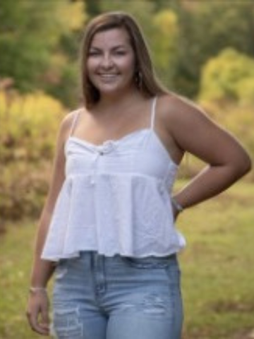 a young woman in a white shirt