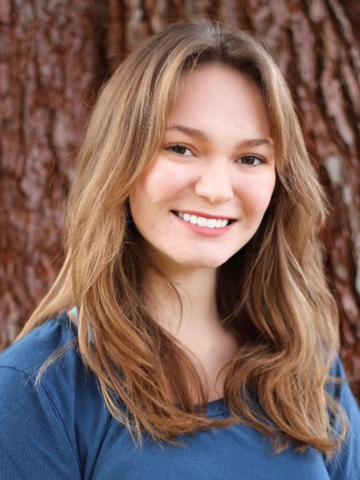 a young woman in a blue shirt