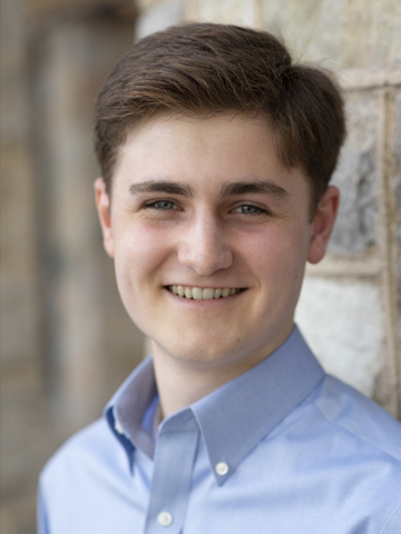 a young man in a blue button down shirt