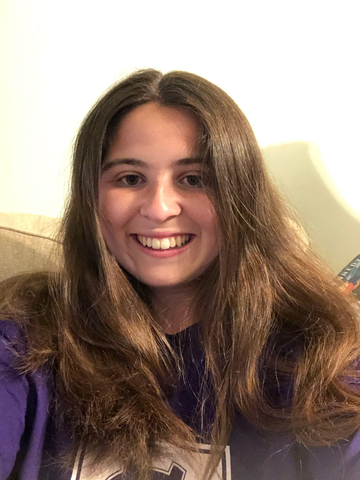 a young woman in a purple shirt