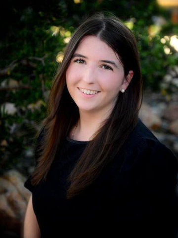 a young woman in a black shirt