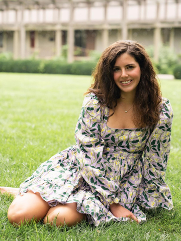 a young woman in a floral dress