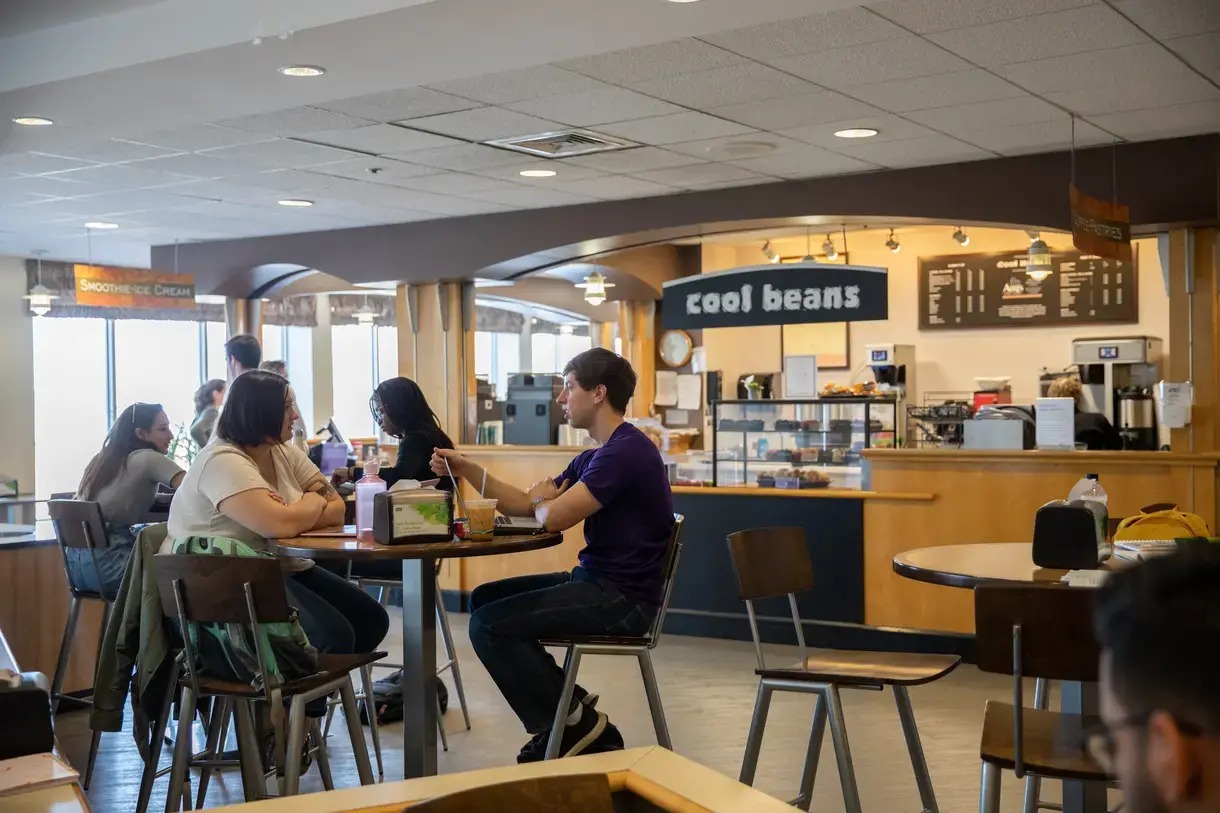 Students chat and eat at Cool Beans in the Hogan Center